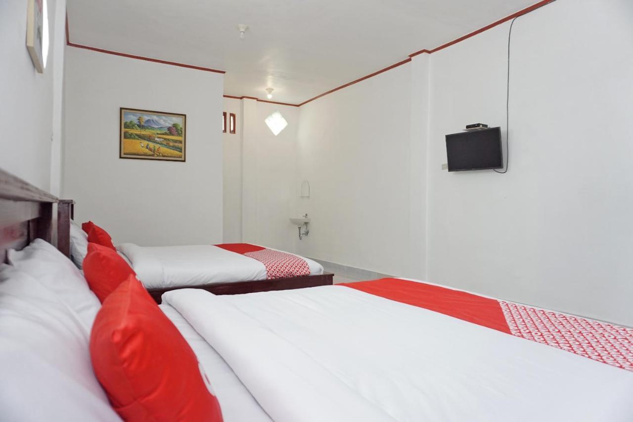 Oyo 2635 Ramos Inn Sinapuran Bagian luar foto