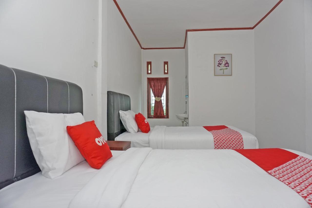 Oyo 2635 Ramos Inn Sinapuran Bagian luar foto