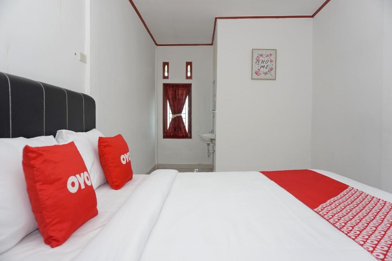 Oyo 2635 Ramos Inn Sinapuran Bagian luar foto
